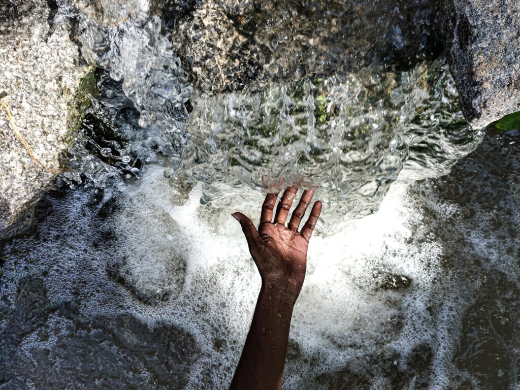 Person Touching Water